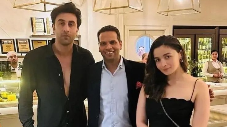 Alia Bhatt And Ranbir Kapoor Pose With A Fan As They Step Out For A