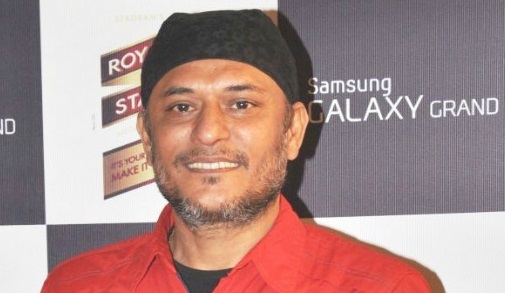 Tochi Raina in red and black