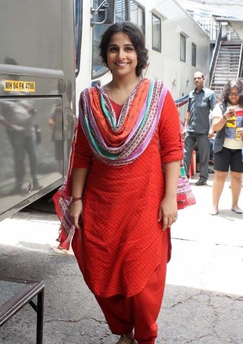 Vidya Balan in red suit.
