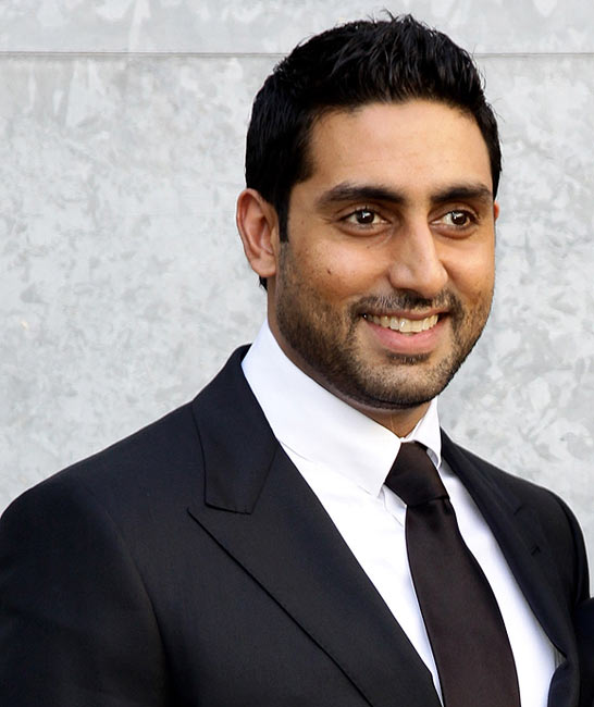 Abhishek Bachchan smie