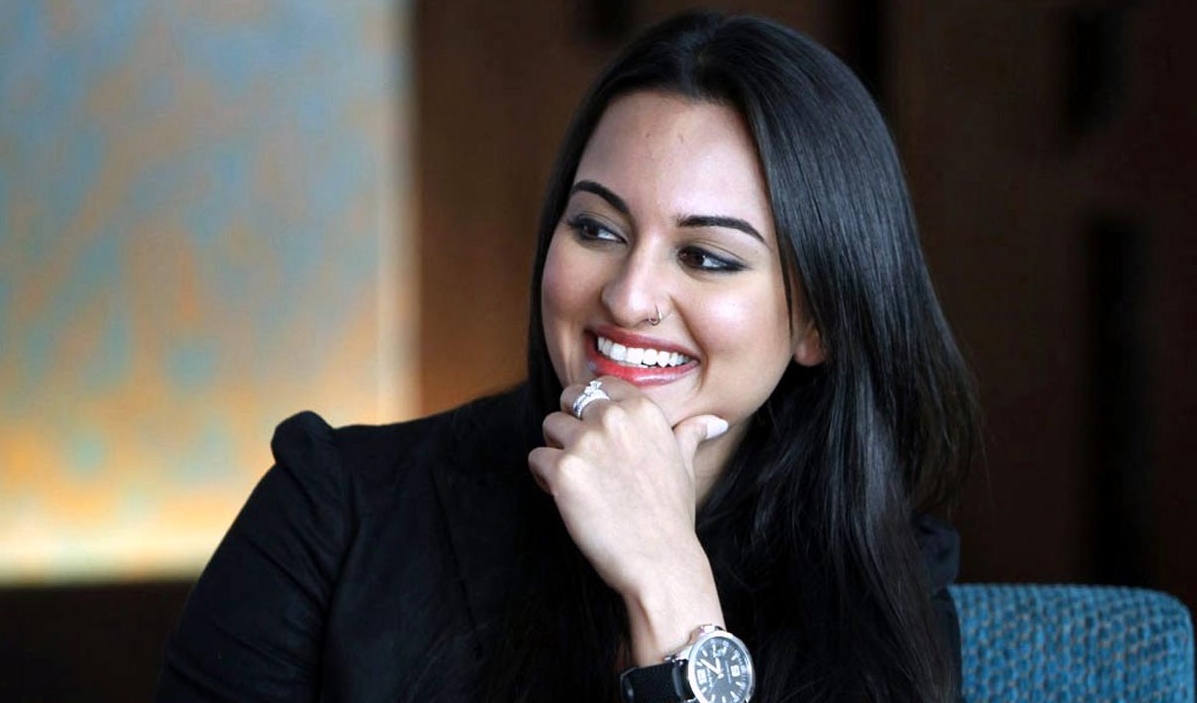 Sonakshi Sinha in black smiling