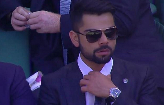Virat Kohli watching match