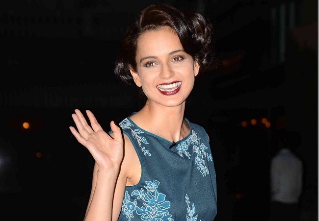 Kangana Ranaut laughing