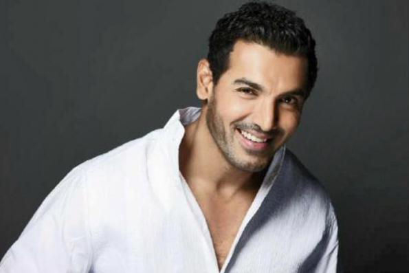 John Abraham in white shirt