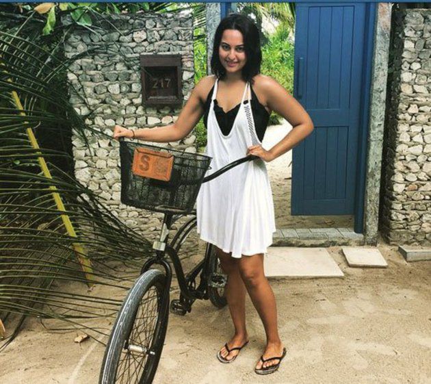 Sonakshi Sinha riding bicycle