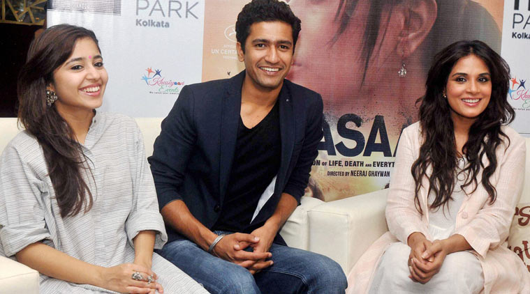 Masaan director with the cast at an event