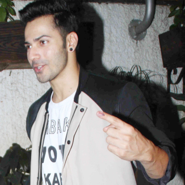 Varun Dhawan ear studs