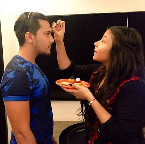 Aditya Narayan with sister