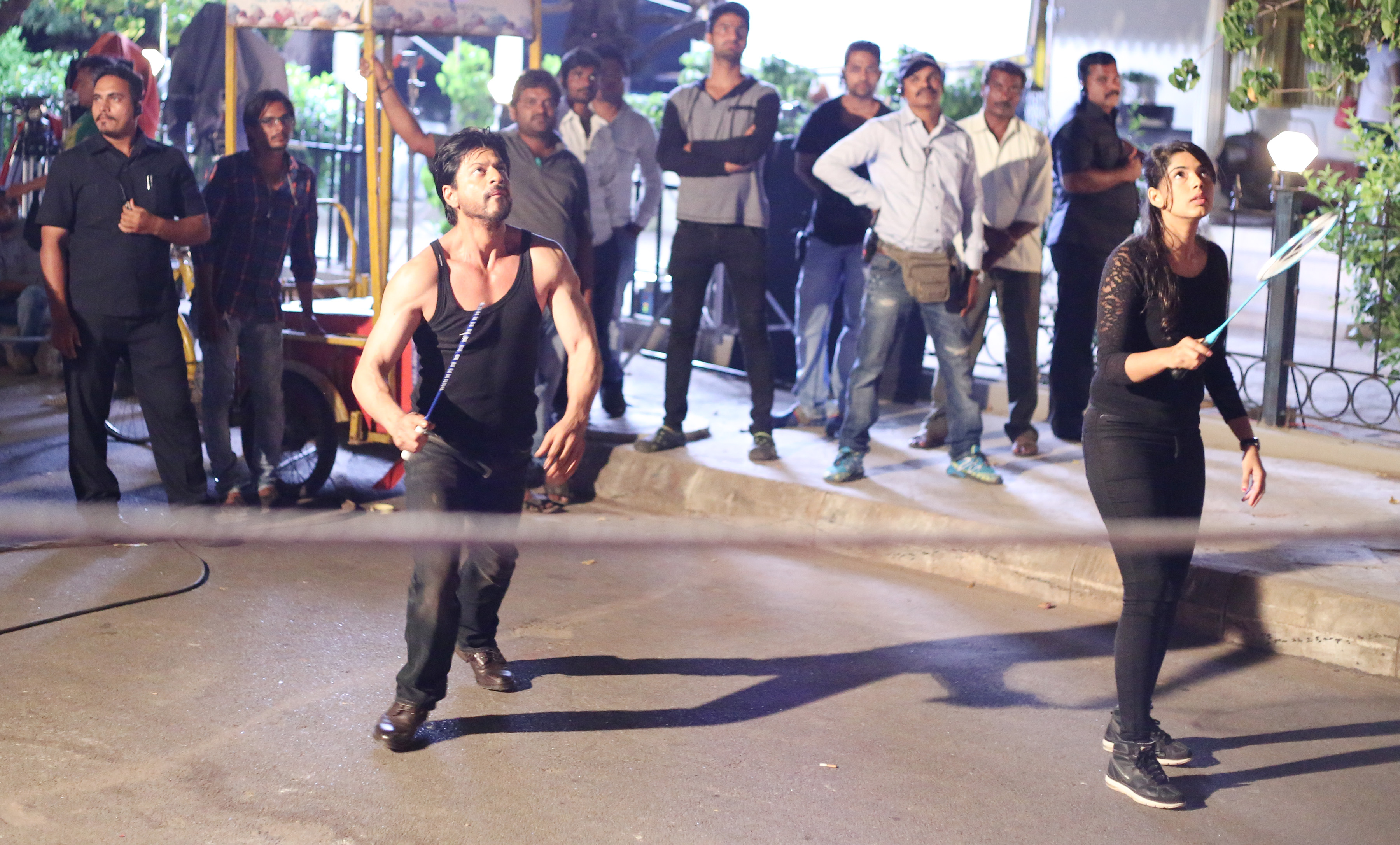 Shah Rukh Khan playing badminton