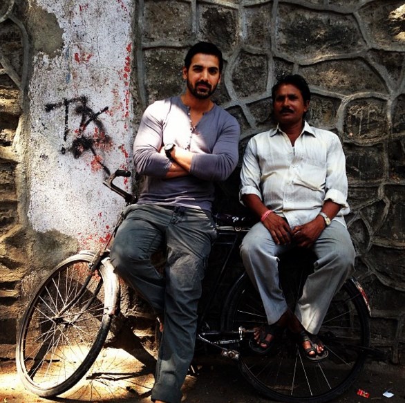 John Abraham on a cycle