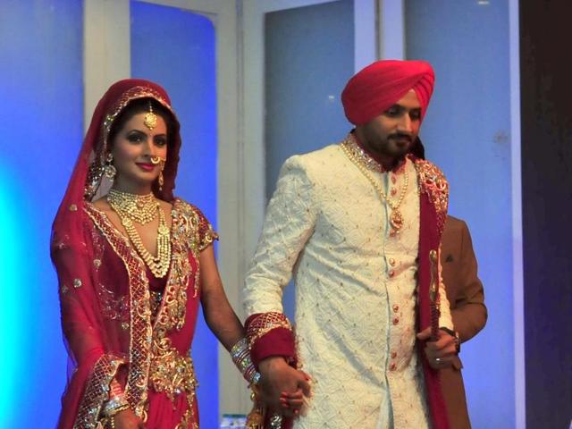 Harbharjan Singh with wife Geeta Basra after their wedding ceremony.