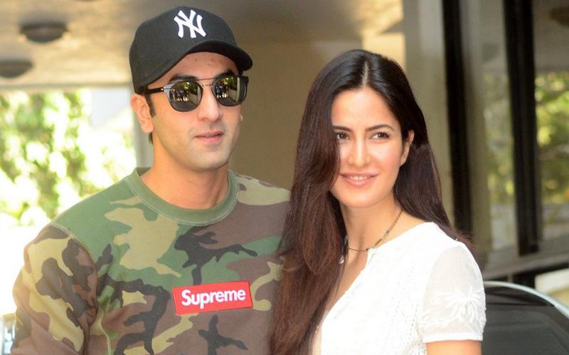 Ranbir Kapoor and Katrina Kaif smiling at the cameras