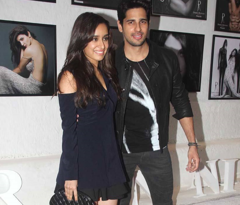 Shraddha Kapoor , Sidharth Malhotra posing for cameras