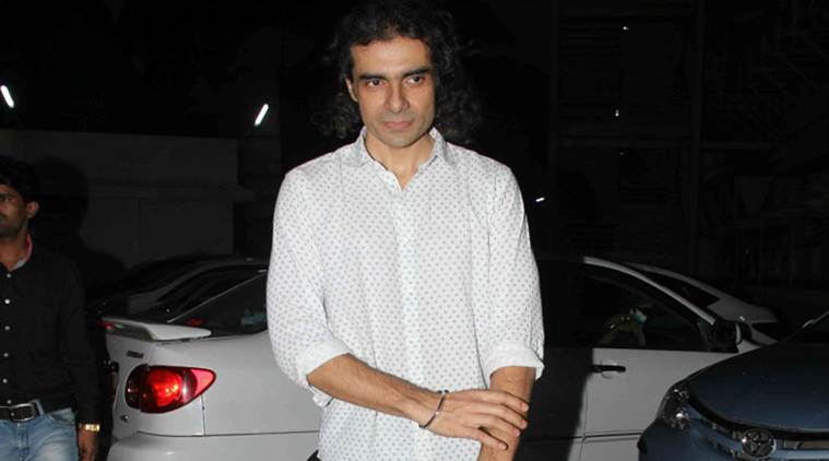 Imtiaz Ali in white shirt