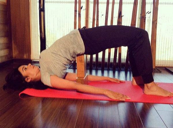 Bollywood actresses practicing yoga