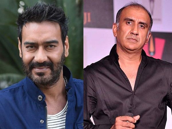 Ajay Devgn and Milan Luthria