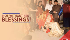 Rekha bows down to Asha Bhosle to take the singer's blessings. View Pics!