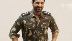 John Abraham's military look is hotter than the hottest summer day!
