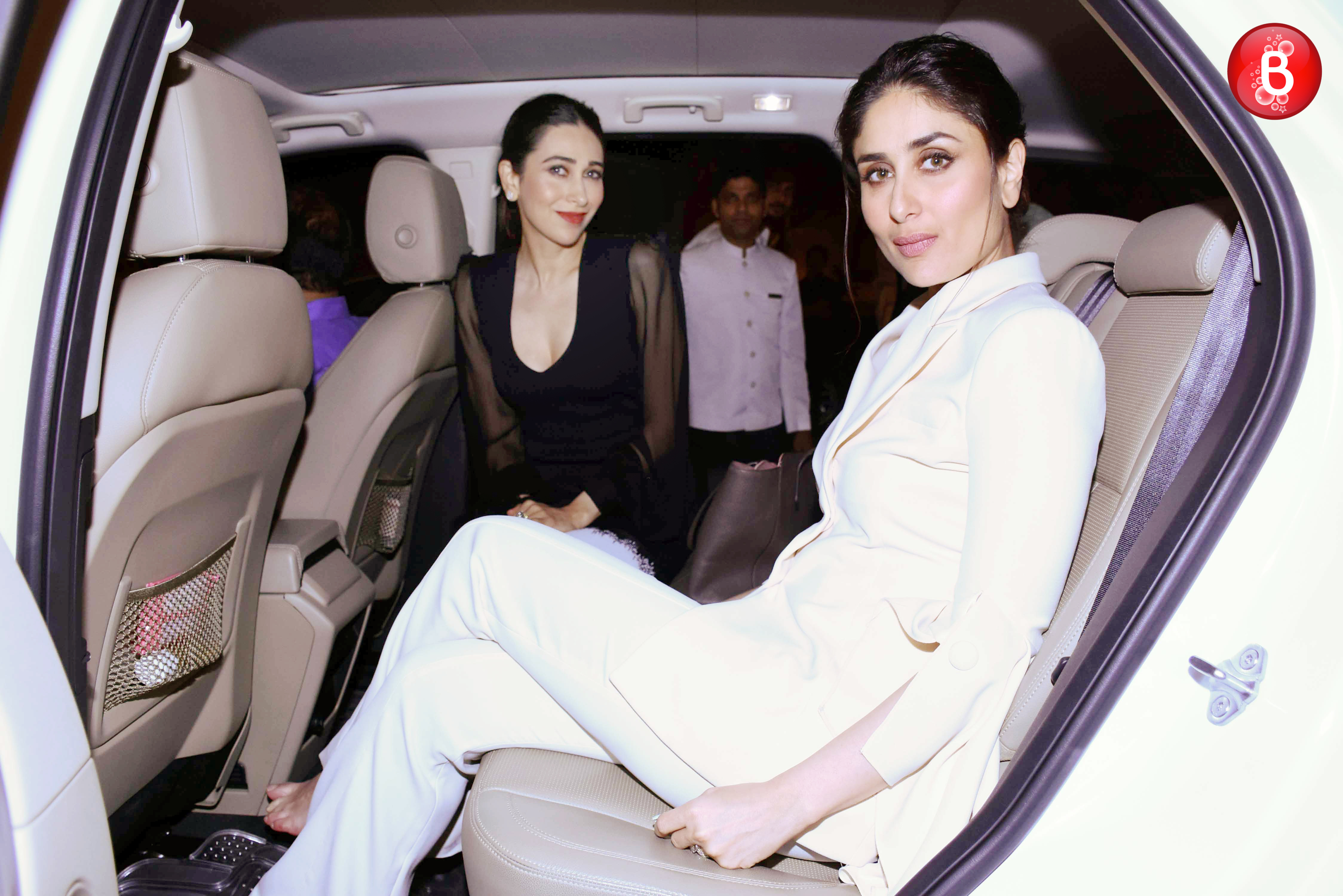 Karisma and Kareena go monochrome at an event in Mumbai. View Pics!