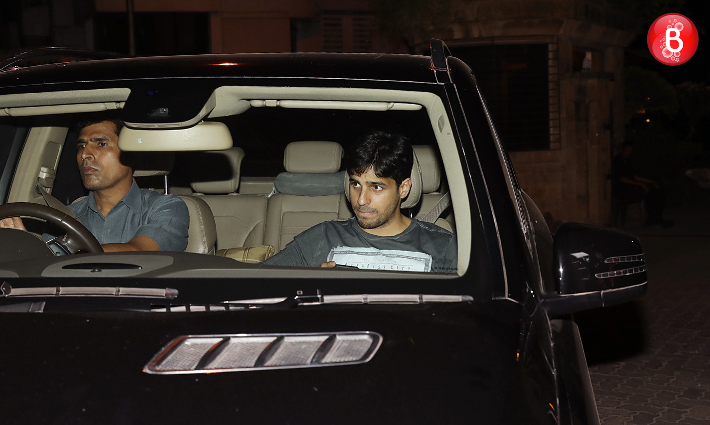 Sidharth Malhotra drops by to meet mentor Karan Johar at his house. SEE ...