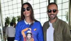 Sonam Kapoor rocks the casual look in a 'Mr.India' t-shirt with hubby Anand