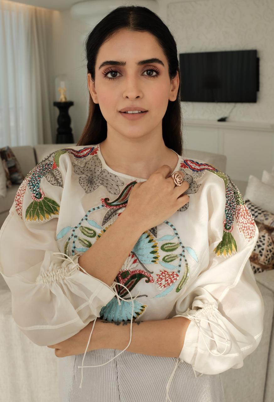 Sanya Malhotra looks stylishly elegant in an ivory outfit | Bollywood ...