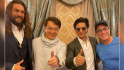 Shah Rukh Khan strikes a pose with Jackie Chan, Jason Mamoa and Jean-Claude Van Damme