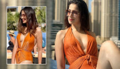 Raai Laxmi amps up the heat on the internet with her orange monokini pictures