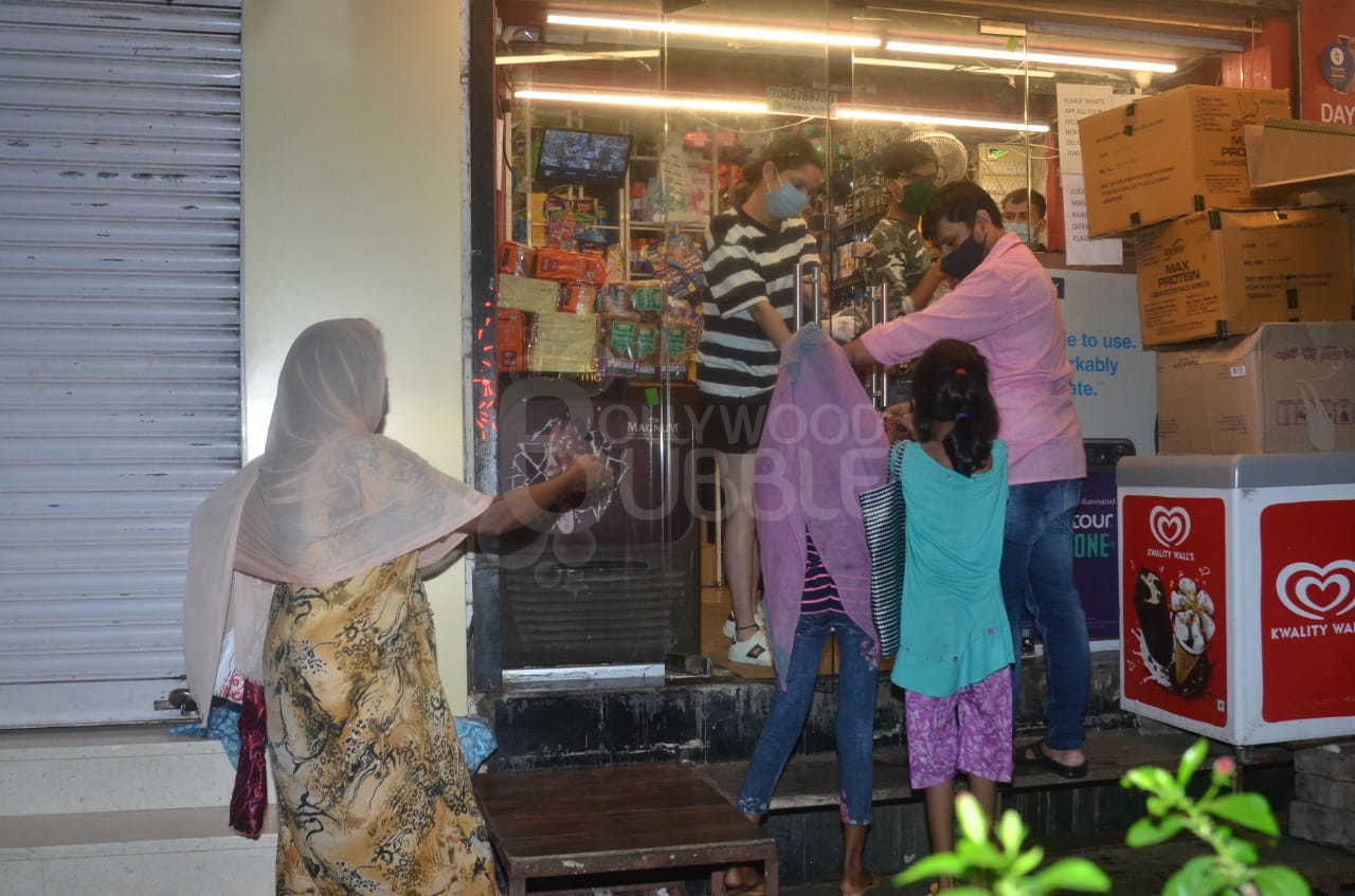 Ankita distributing sweets
