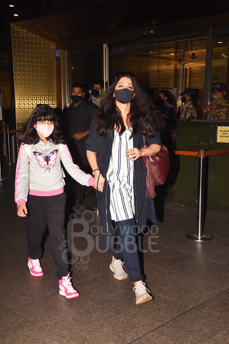 Aishwarya Rai Bachchan, Abhishek Bachchan and Aaradhya airport