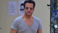 Netizens are stunned with Fardeen Khan's physical transformation as he poses with Rohit Roy in latest pic