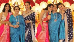 Kajol poses for a love-soaked pic with mom Tanuja and sister Tanishaa Mukerji; it's a family reunion at the Durga Puja pandal