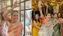 Karisma Kapoor gives out a victorious expression as Alia Bhatt's kaleera falls on her
