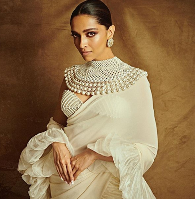 Deepika Padukone visually treats Cannes 2022 one last time as she stuns in a gorgeous white ruffle saree