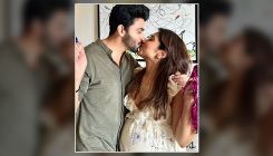 Dheeraj Dhoopar gives a passionate kiss to wife Vinny Arora in new baby shower pics