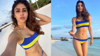 Mouni Roy flaunts her toned midriff in bikini photos, fan says 'Uff'