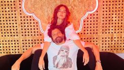 Farhan Akhtar and Shibani Dandekar twin in white as they pose for a lovesoaked photo from Australia