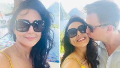 Preity Zinta smiles as husband Gene Goodenough gives her a kiss on Caribbean vacation