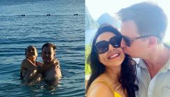 Preity Zinta slips into a sexy black swimsuit as husband Goodenough carries her close in his arms-PICS