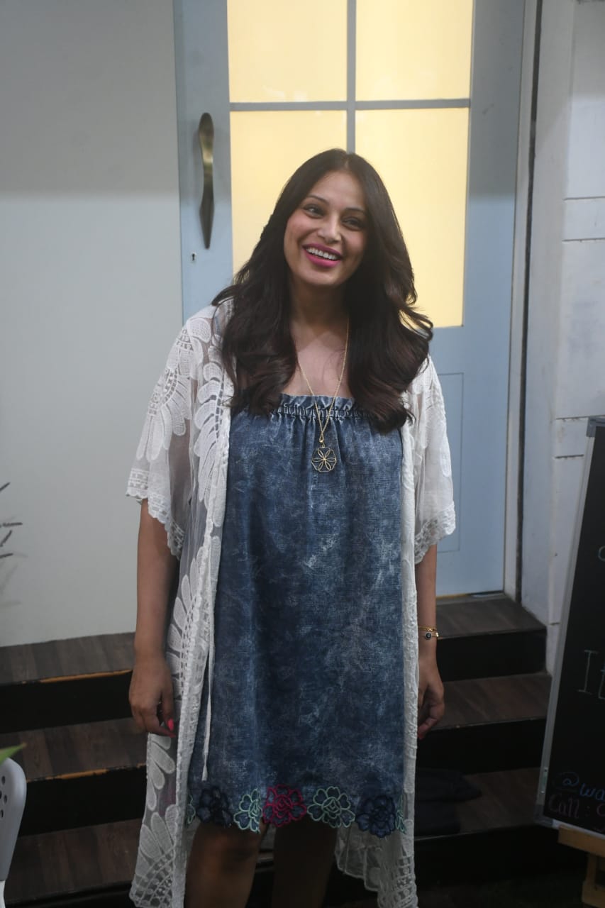 Bipasha donned a blue dress and white shrug