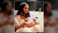 Sonam Kapoor adorably holds son Vayu in photo from Diwali bash clicked by husband Anand Ahuja