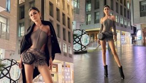 Mouni Roy adds glitter to Dubai streets in a shimmery short skirt and grey cut-out bodysuit
