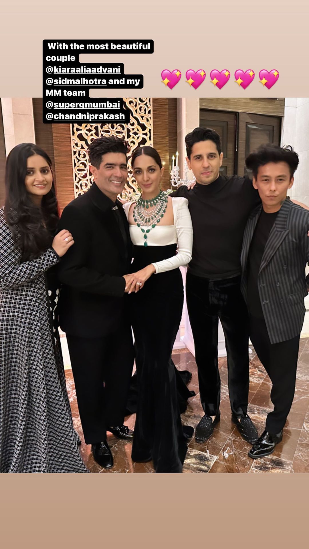 Manish Malhotra with the newlyweds