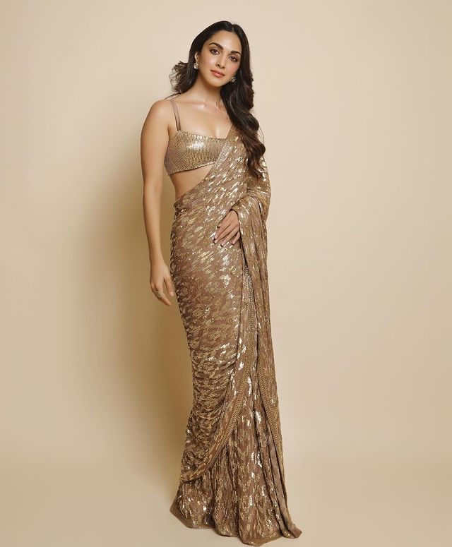 kiara in gold saree