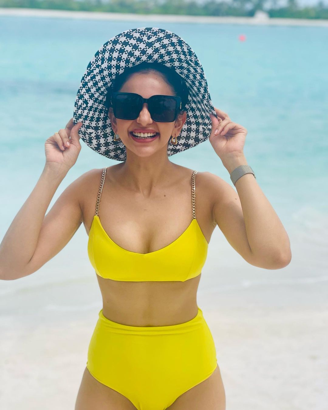 Rakul Preet Singh Teases Fans With Her Sexy Look In Yellow Bikini