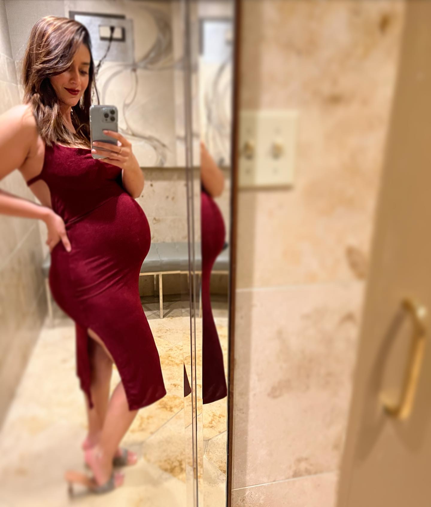 Ileana D'Cruz flaunts her baby bump in stunning red dress