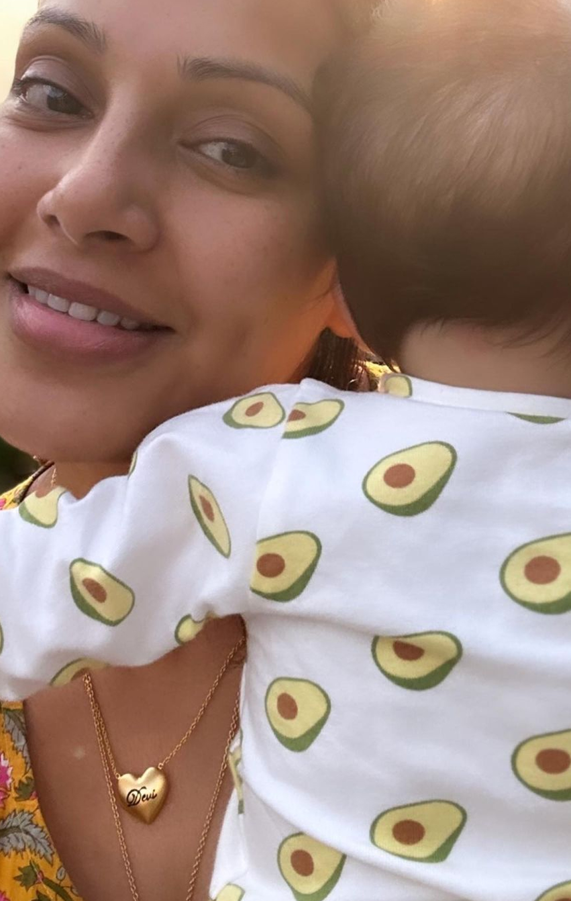 Bipasha shares a cuddly hug with Devi