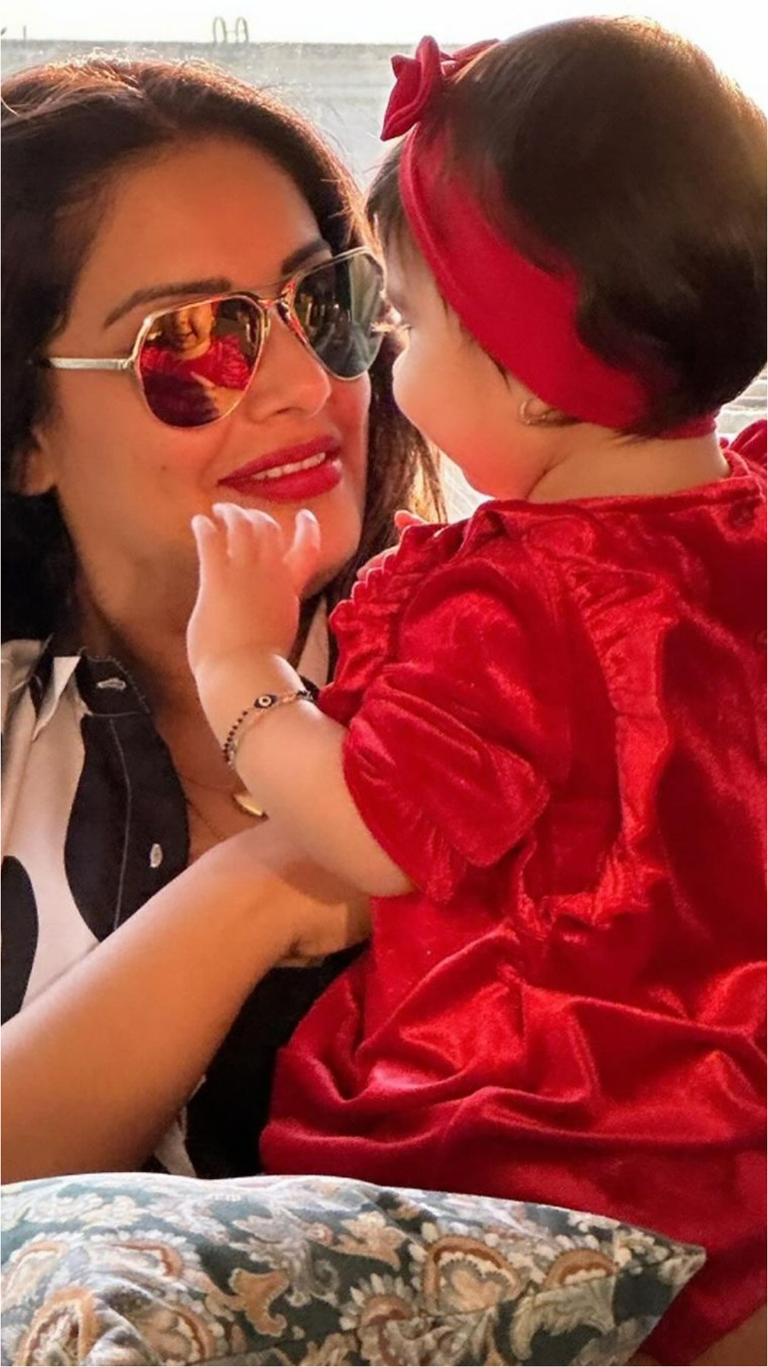 Can’t take her eyes off her baby girl