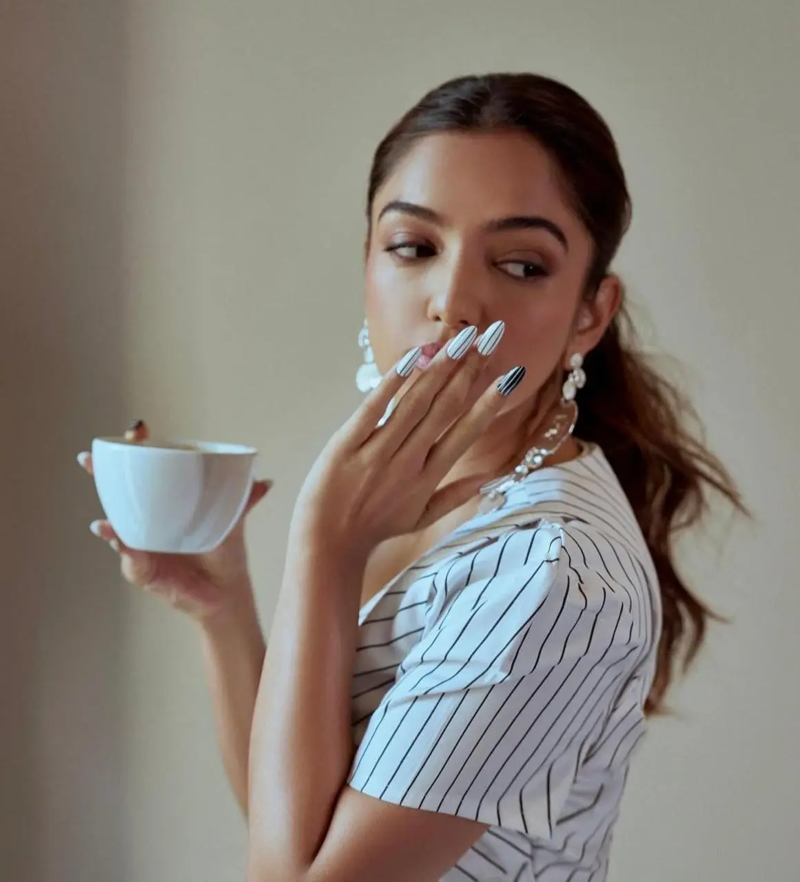 Ahsaas Channa's black and white striped nail art design