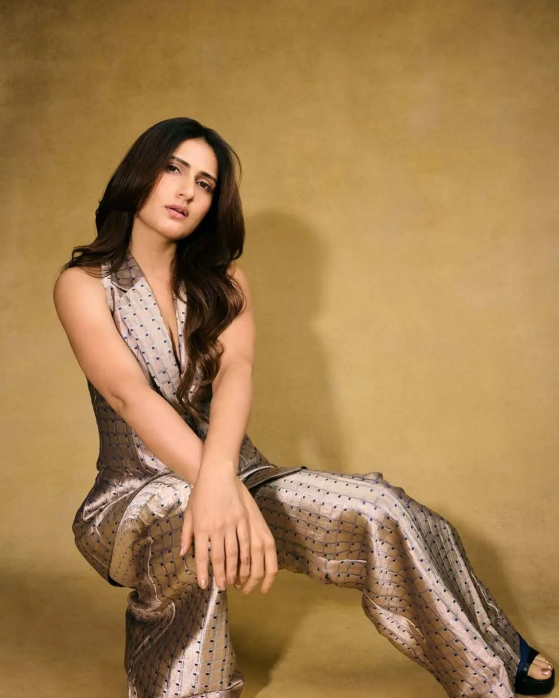 Fatima Sana Shaikh In A Tailored Co-Ord Set Featuring A Sleeveless Metallic Longline Blazer & Wide-legged Pants